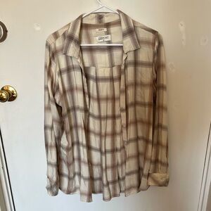 The post plaid button up